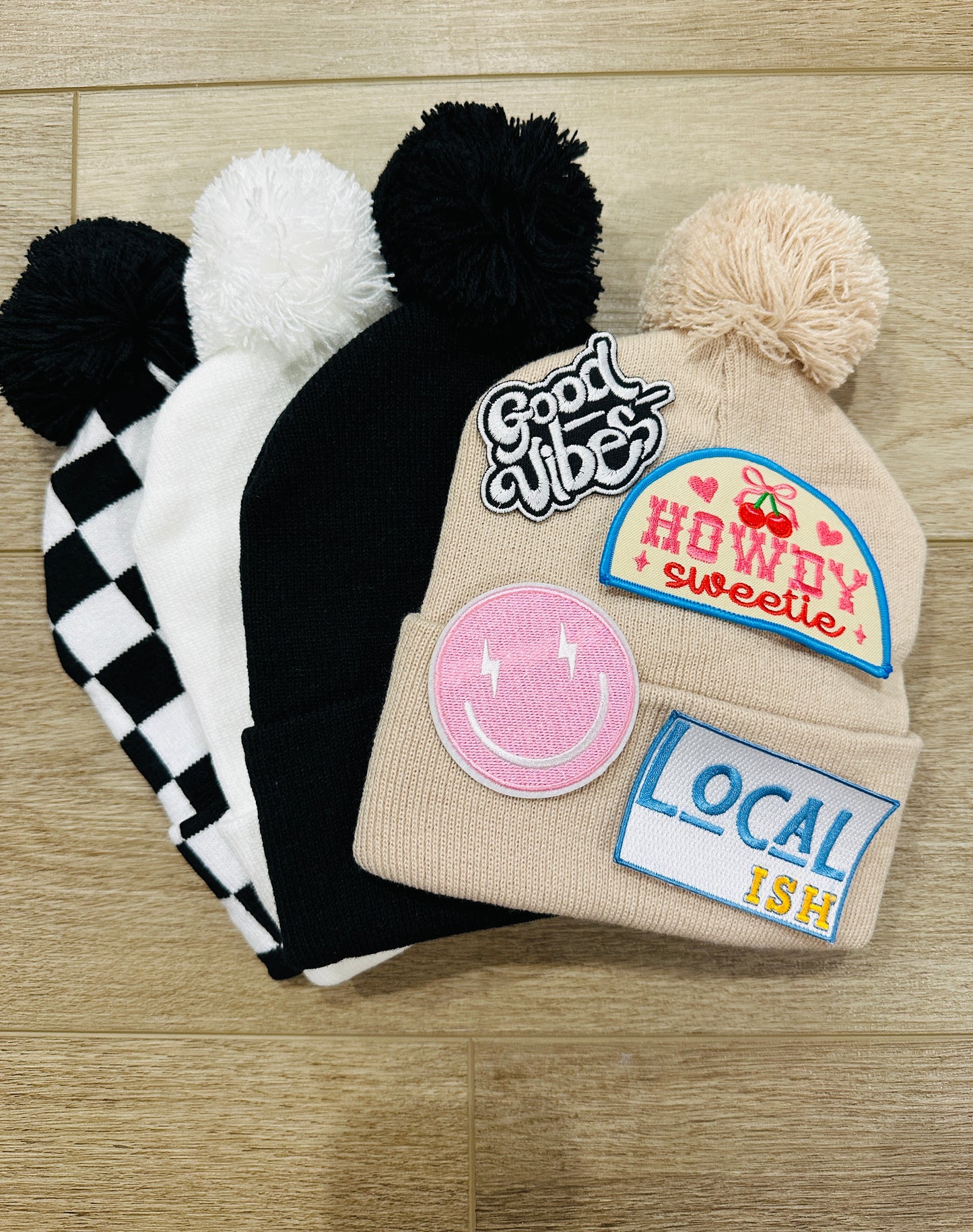 Black & white checkered pom beanie